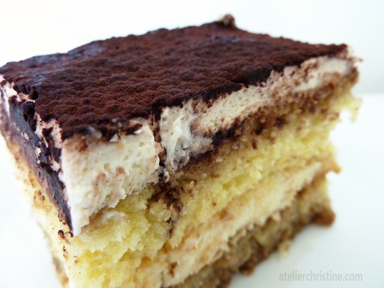 cake  almond  sweet, dense,  using flavored fine pound tiramisu soft textured that custard is